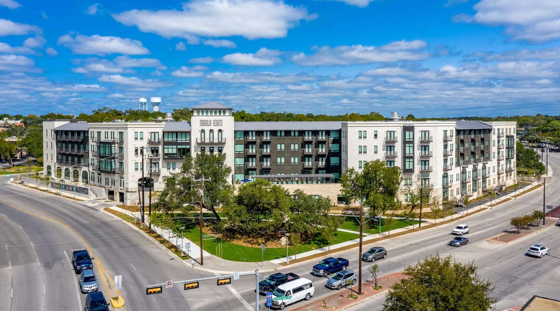 Everyday Conveniences Outside Your Door across the street view of property building showing spacious sidewalks and near landscaping